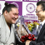 Sumo yokozuna Terunofuji and his stable master Isegahama (former yokozuna Asahifuji.