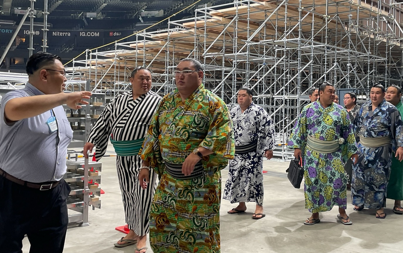Hoshoryu and other sumo wrestlers tour the new arena that will host the 2025 Nagoya tournament.