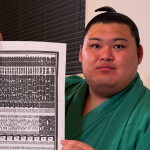 Grand sumo yokozuna Onosato references the 2025 Nagoya banzuke (rankings document).